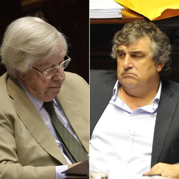 Danilo Astori a la izquierda y el senador nacionalista Sergio Botaba a la derecha