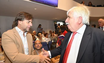 El presidente Luis Lacalle Pou y el fiscal de Corte Juan Gómez